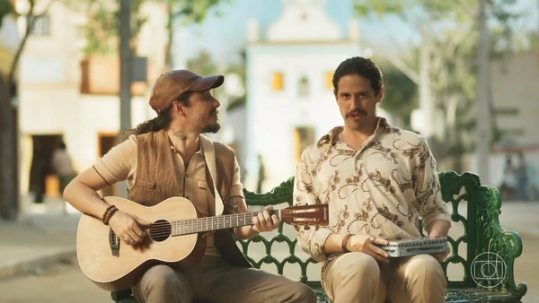 Two men engaging in a musical moment in Mar do Sertão.